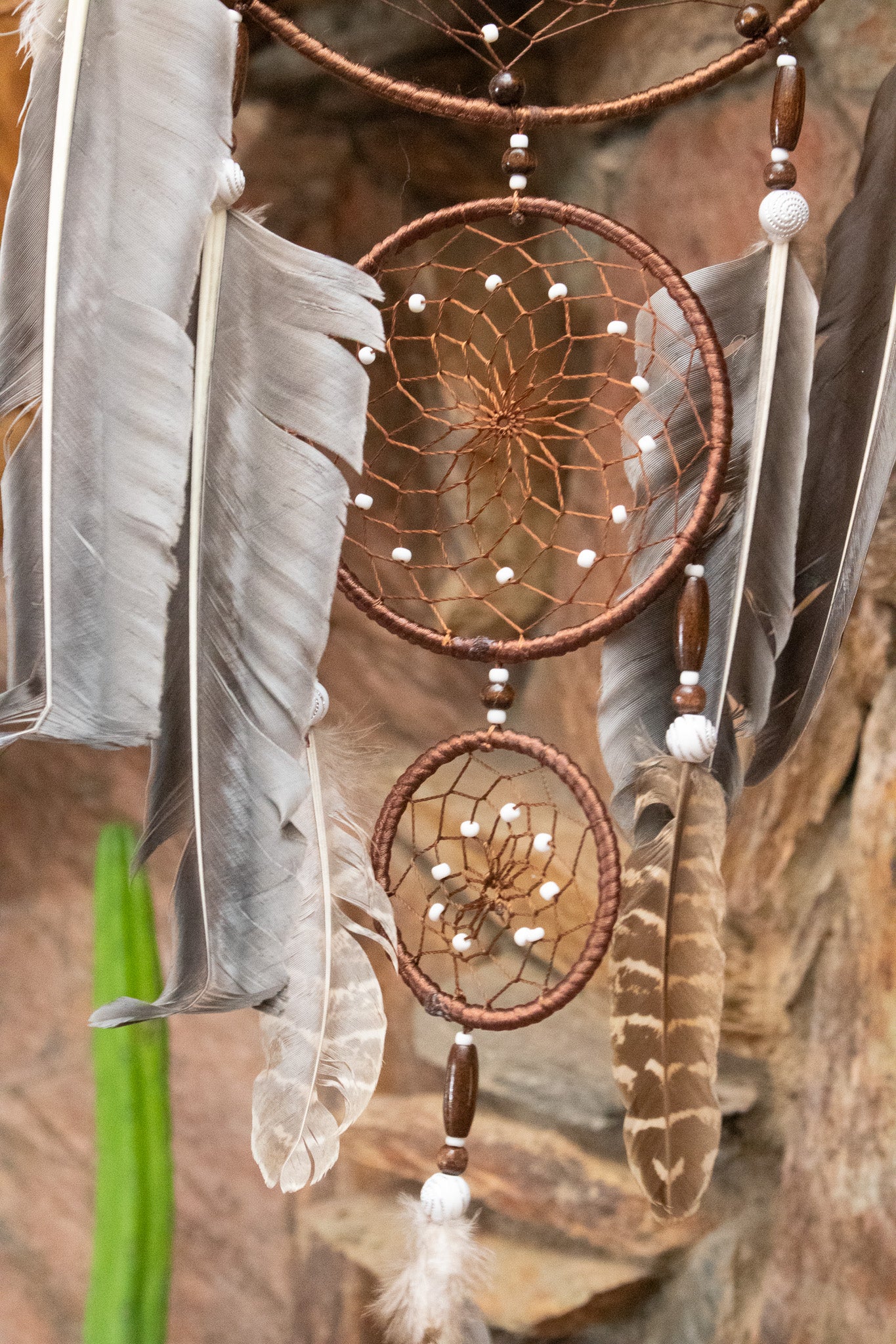 Dark Brown Dream Catcher with Braided Flower and Large Feather Tassels