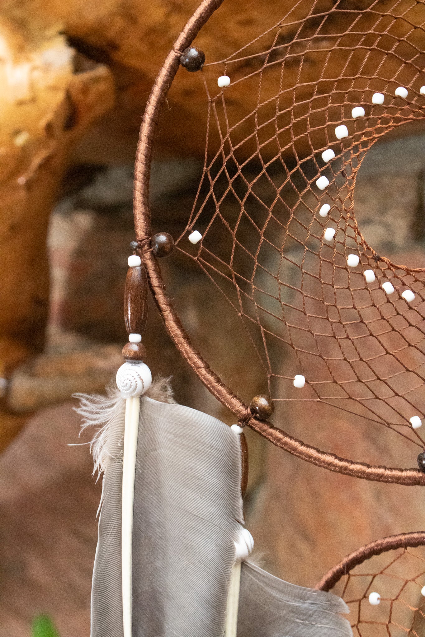 Dark Brown Dream Catcher with Braided Flower and Large Feather Tassels