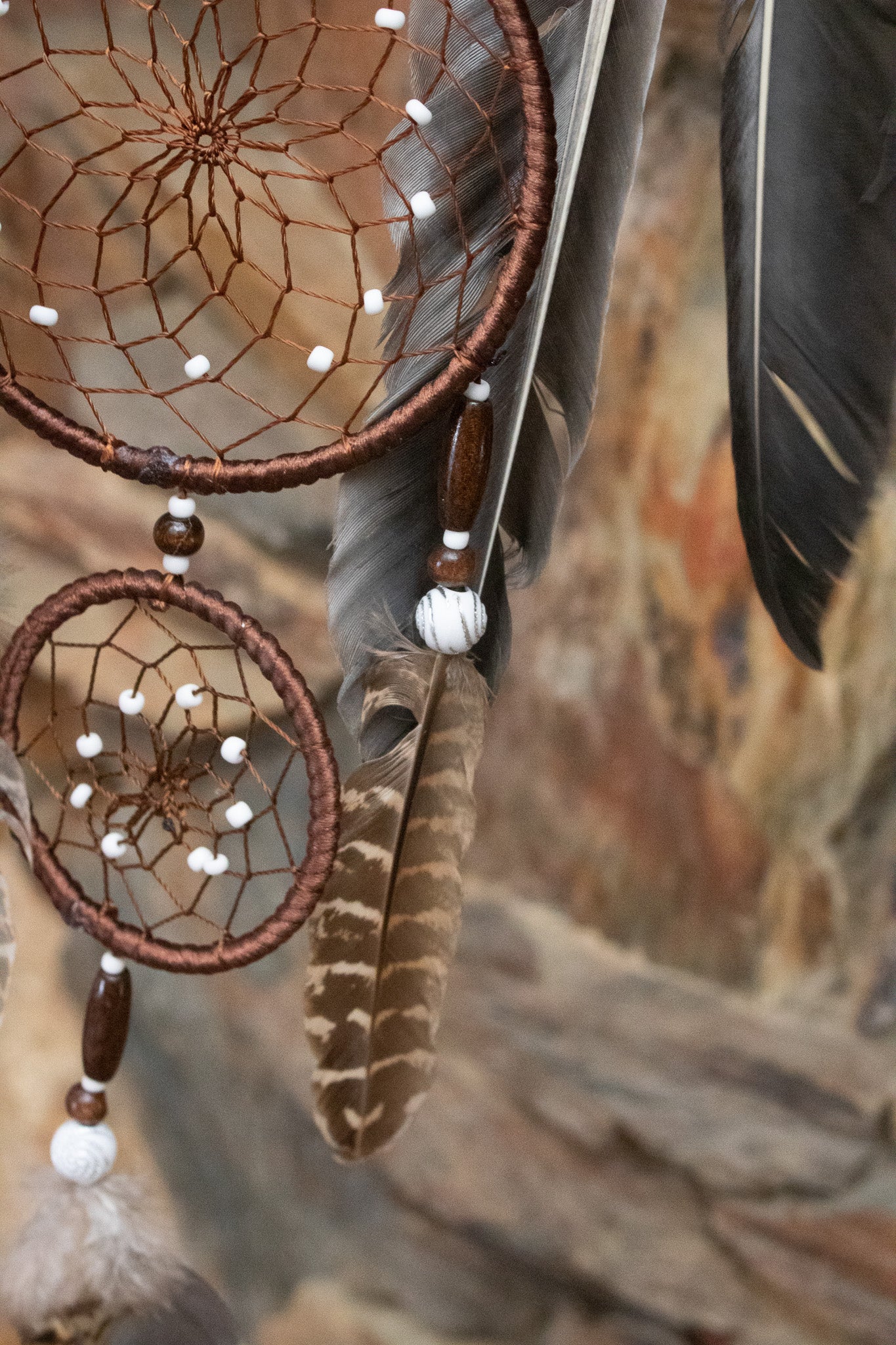 Dark Brown Dream Catcher with Braided Flower and Large Feather Tassels