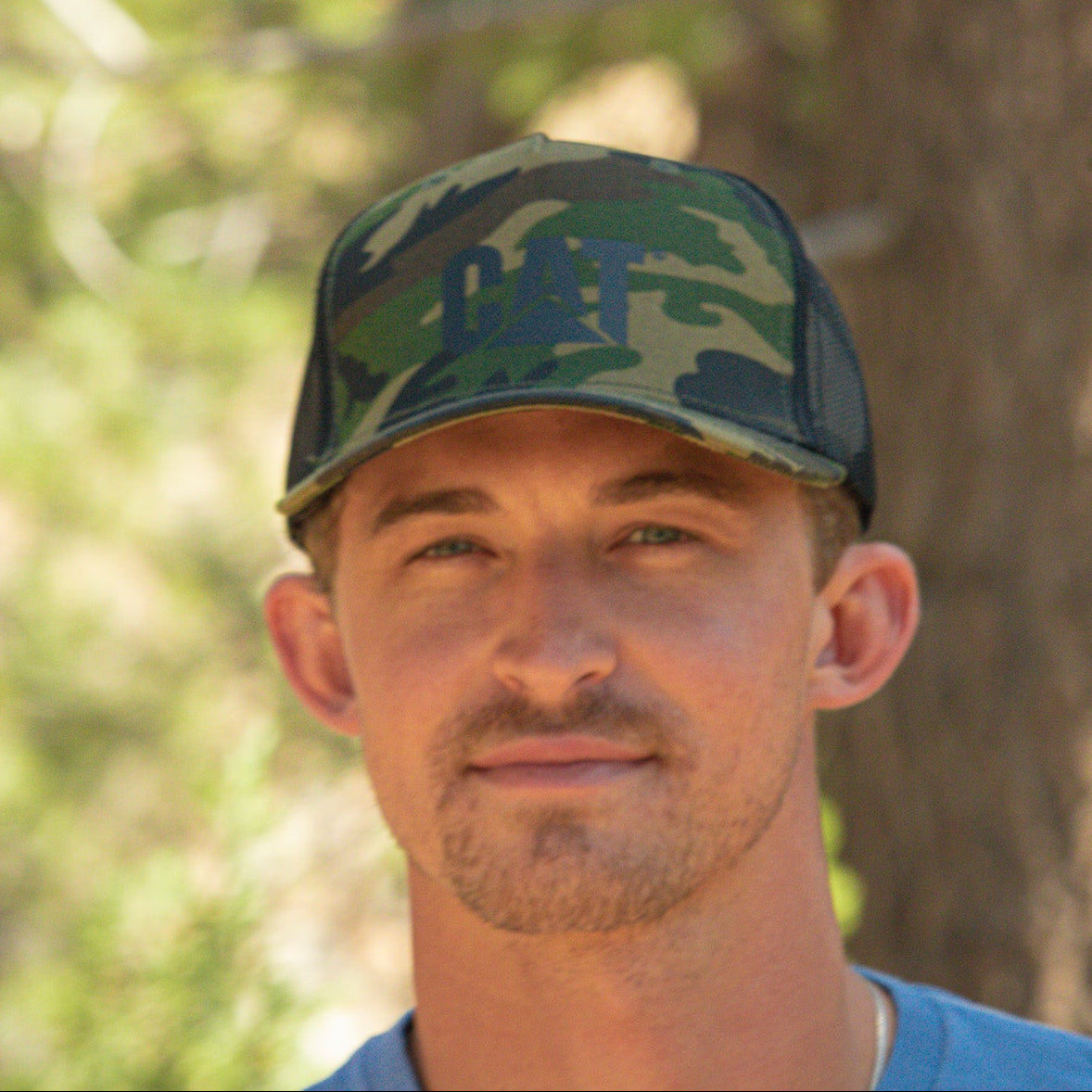 Trucker Cap with Cat Logo Color: Woodland Camo