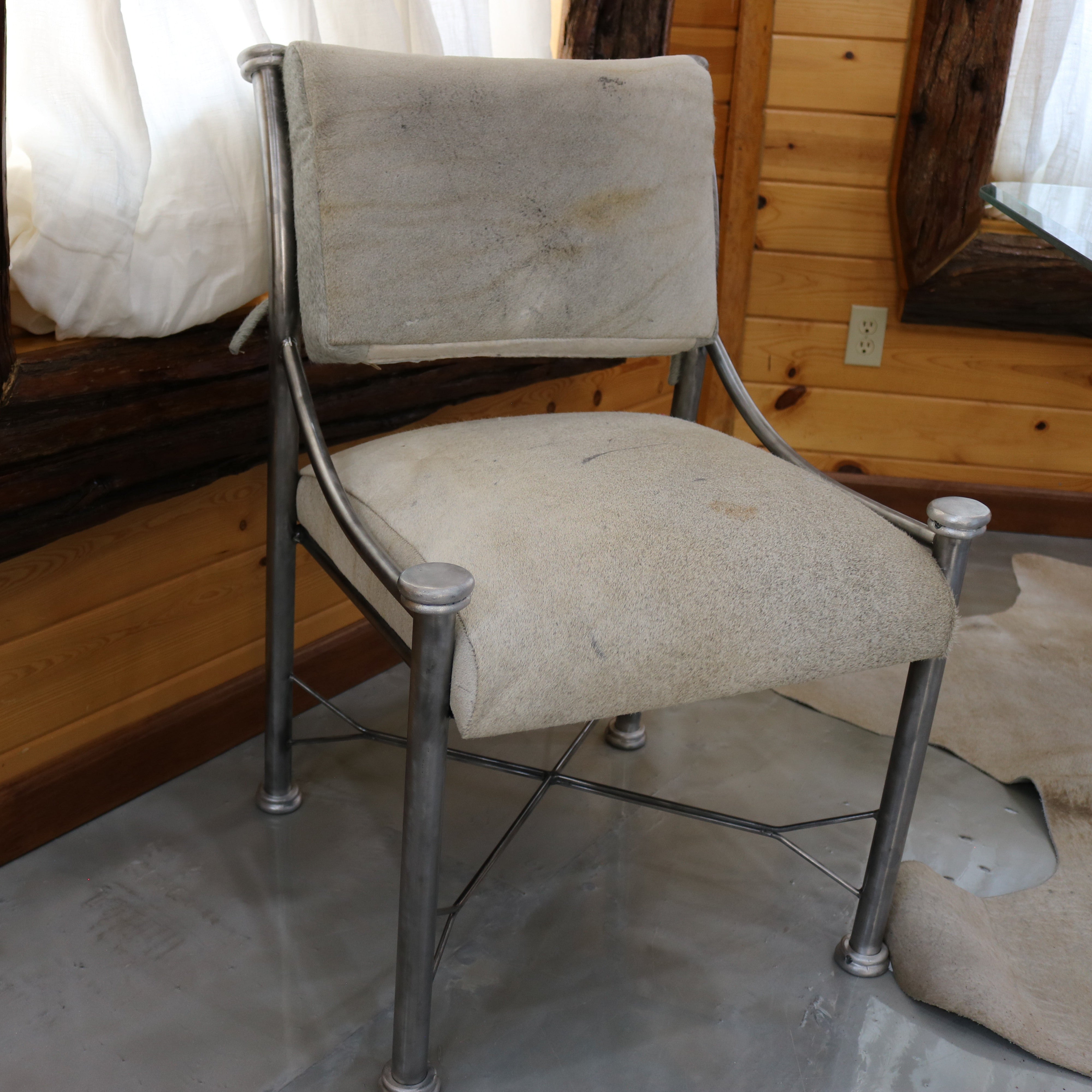 Vintage Raw Metal Table with Glass Tabletop and Six Chairs with Cowhide Cushions (From the Kreiss Collection) Restyled 90s Piece