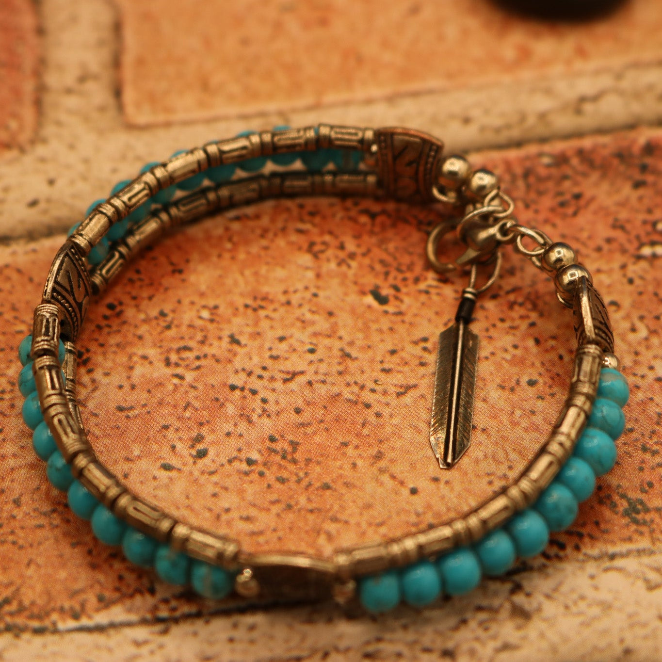 Tibetan Turquoise Colored Gemstone Feather Bracelet