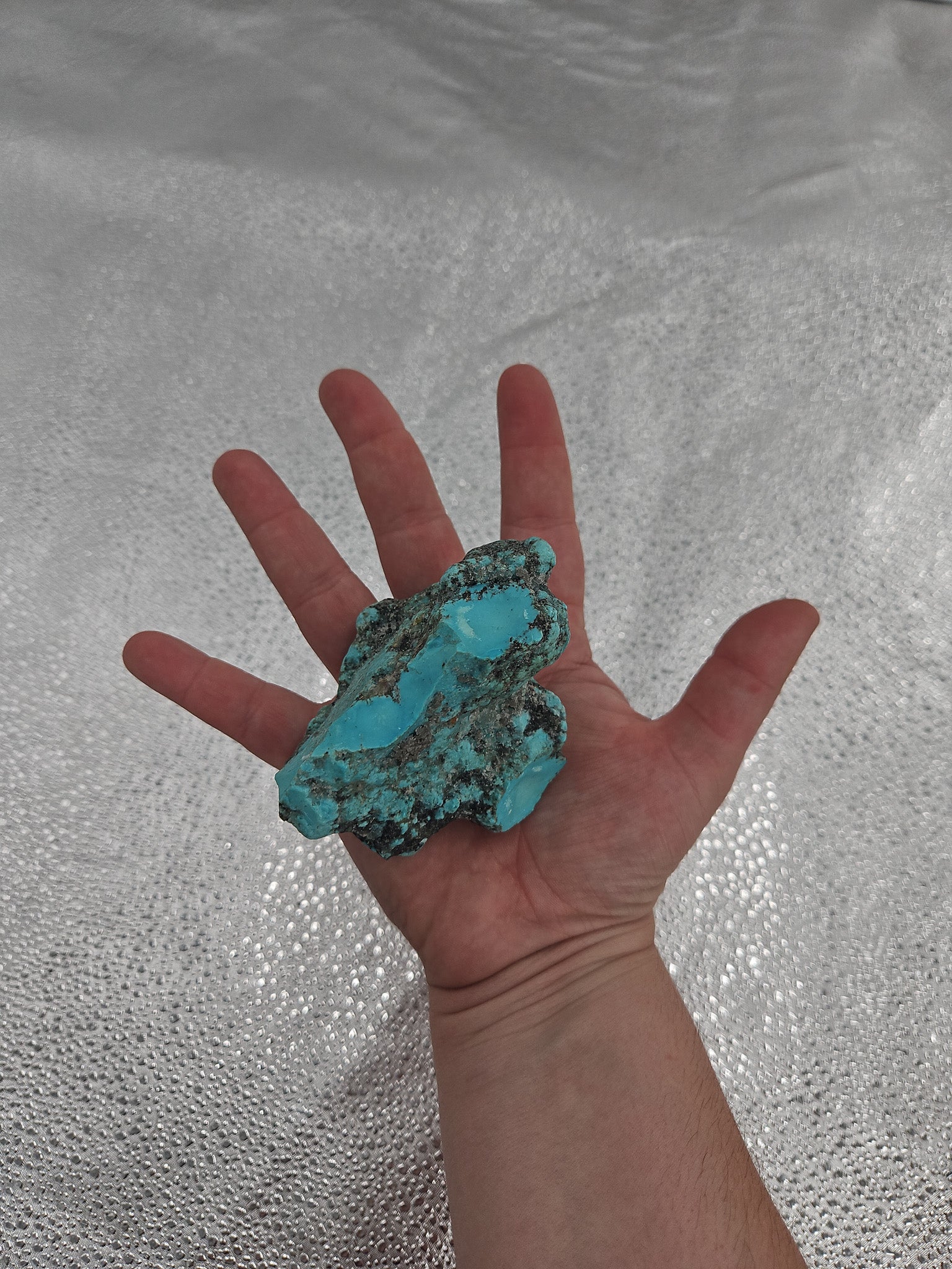 Raw Turquoise with Pyrite in Dark Matrix