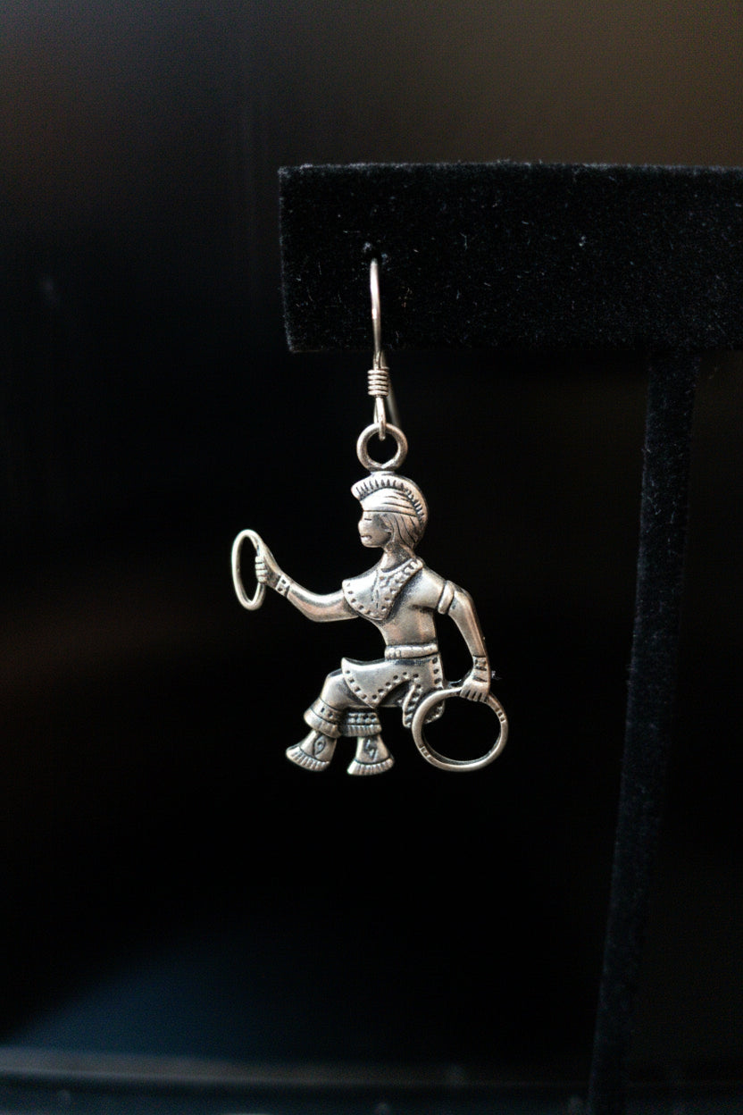 Vintage tested sterling silver Hoop Dancer dangle earrings featuring detailed Southwestern-inspired dancer figures with traditional hoops and fishhook ear wires.