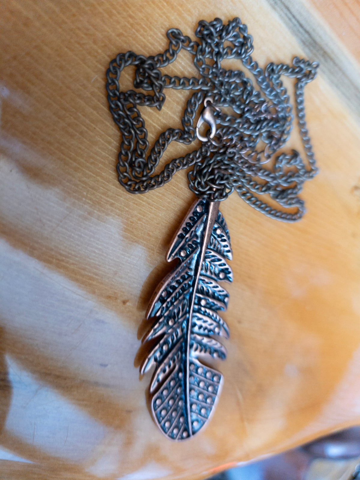 Copper-Tone Feather Pendant on Brass Chain
