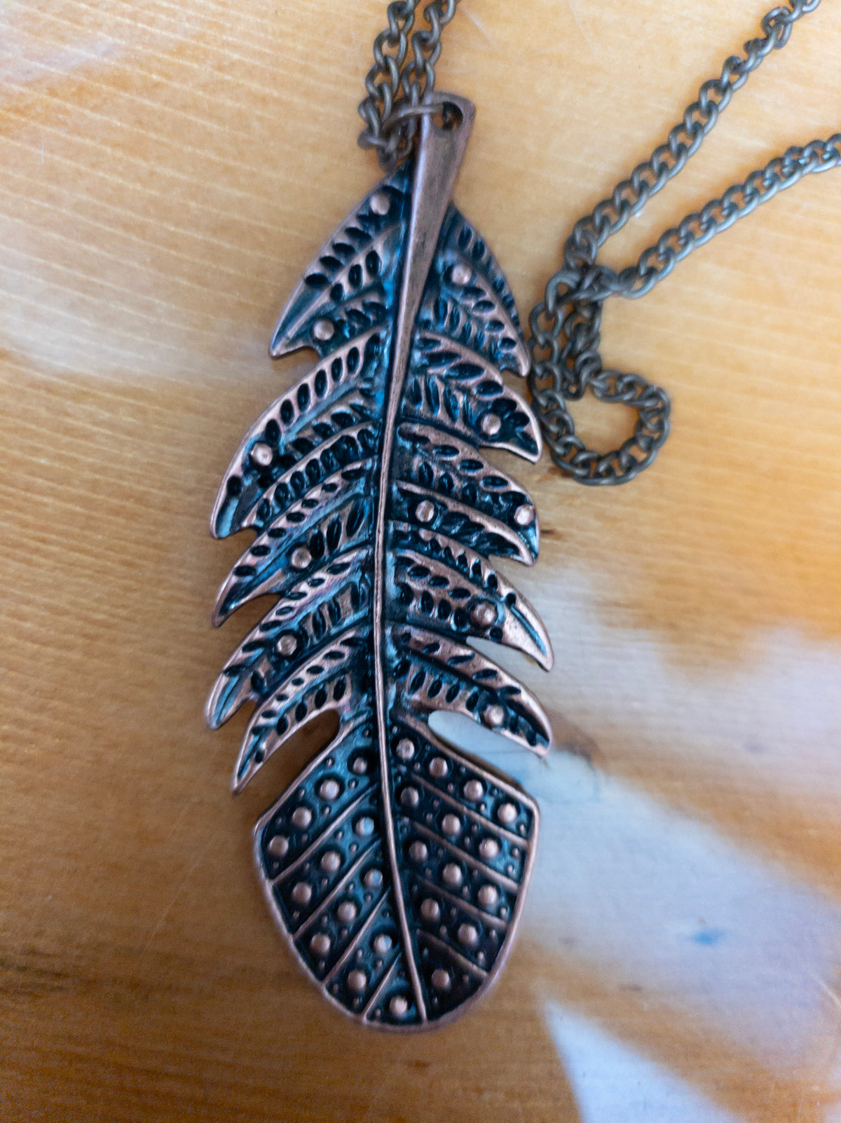 Copper-Tone Feather Pendant on Brass Chain