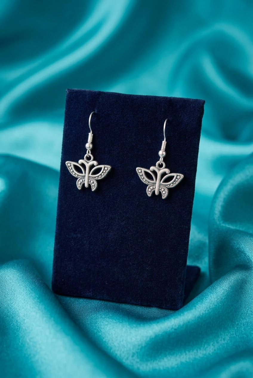 Antique Bronze Butterfly Dangle Earrings with Ornate Wing Details