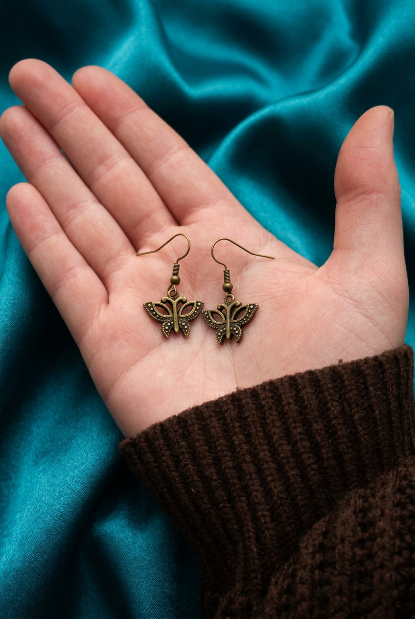 Antique Bronze Butterfly Dangle Earrings with Ornate Wing Details