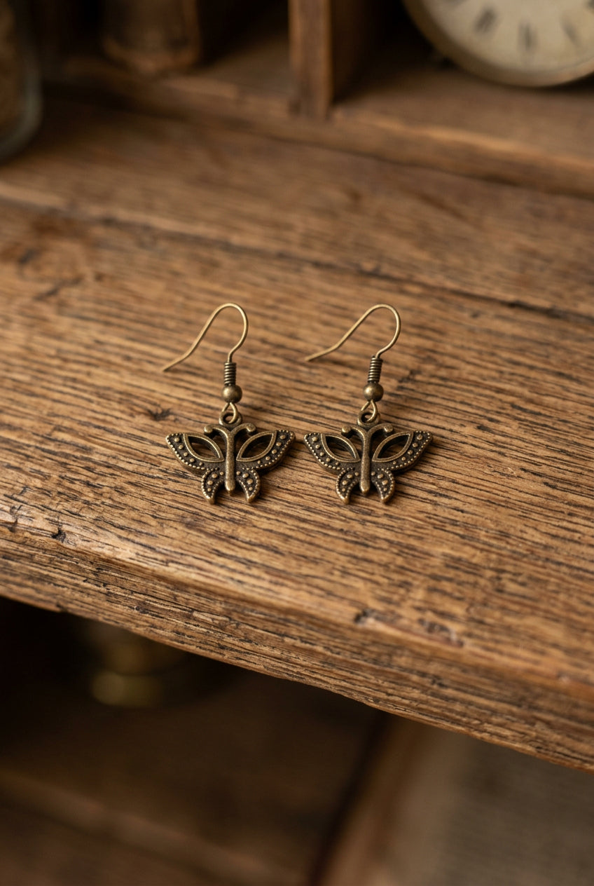 Antique Bronze Butterfly Dangle Earrings with Ornate Wing Details