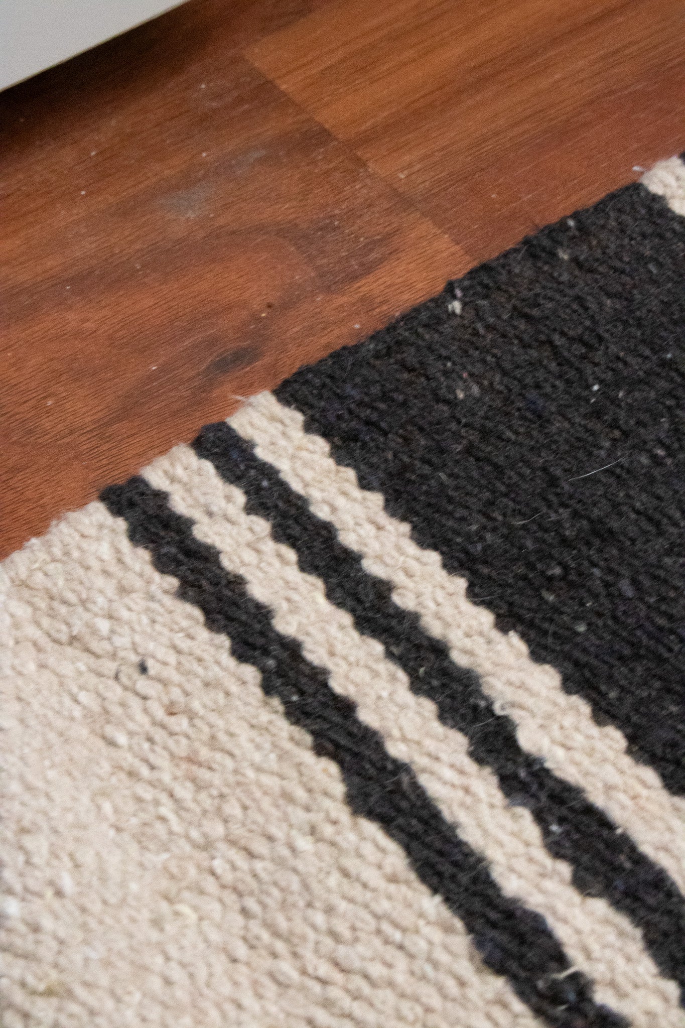 Modern Black and Tan Colored Striped Wool Rug