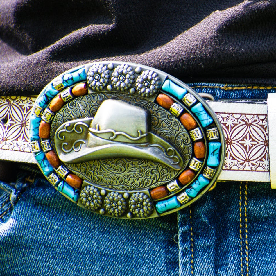 Western Cowboy Hat-themed Belt Buckle on a Engraved White Leather Belt Band