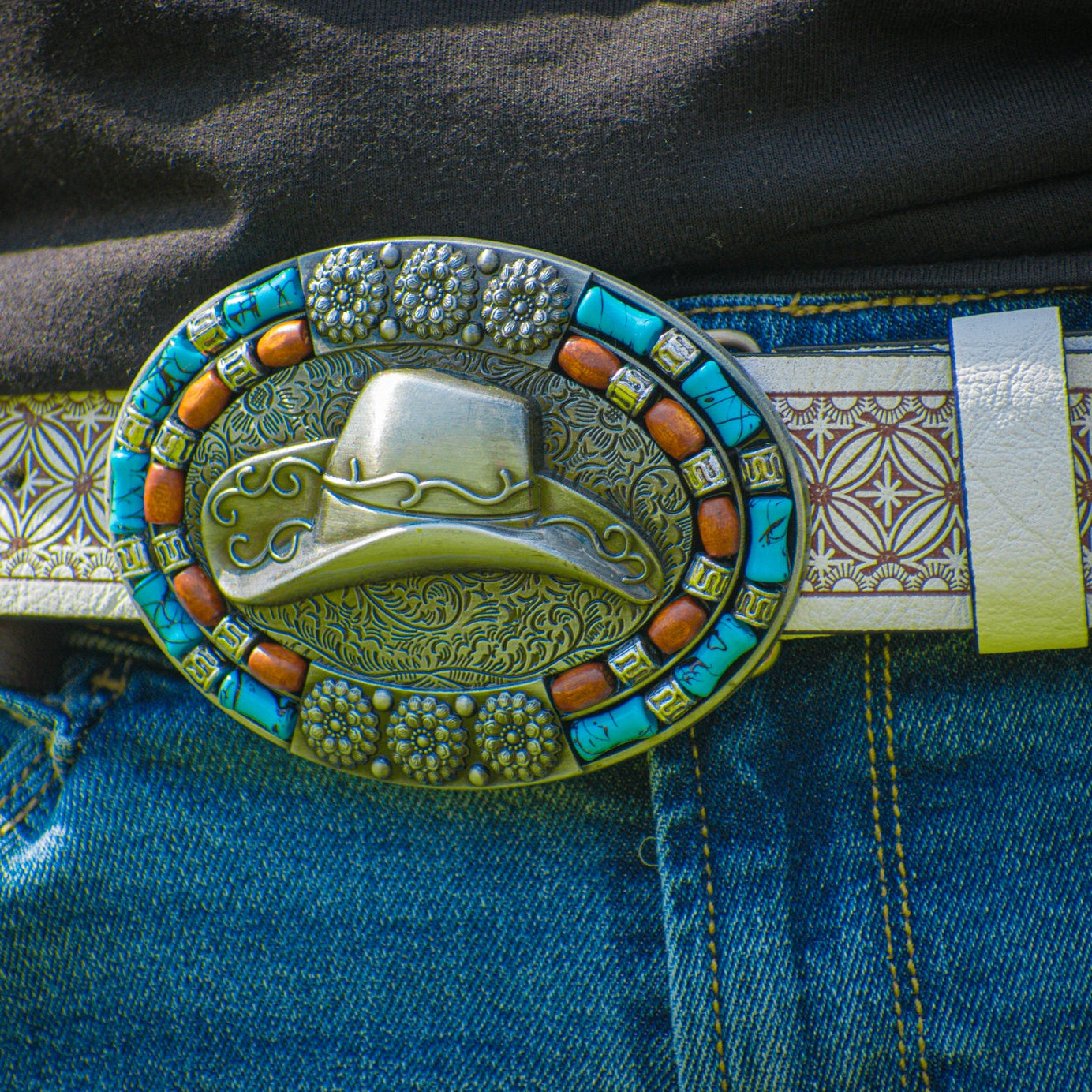 Western Cowboy Hat-themed Belt Buckle on a Engraved White Leather Belt Band
