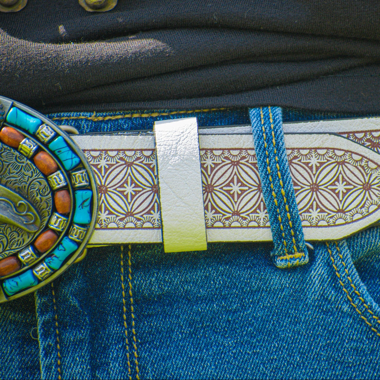 Western Cowboy Hat-themed Belt Buckle on a Engraved White Leather Belt Band