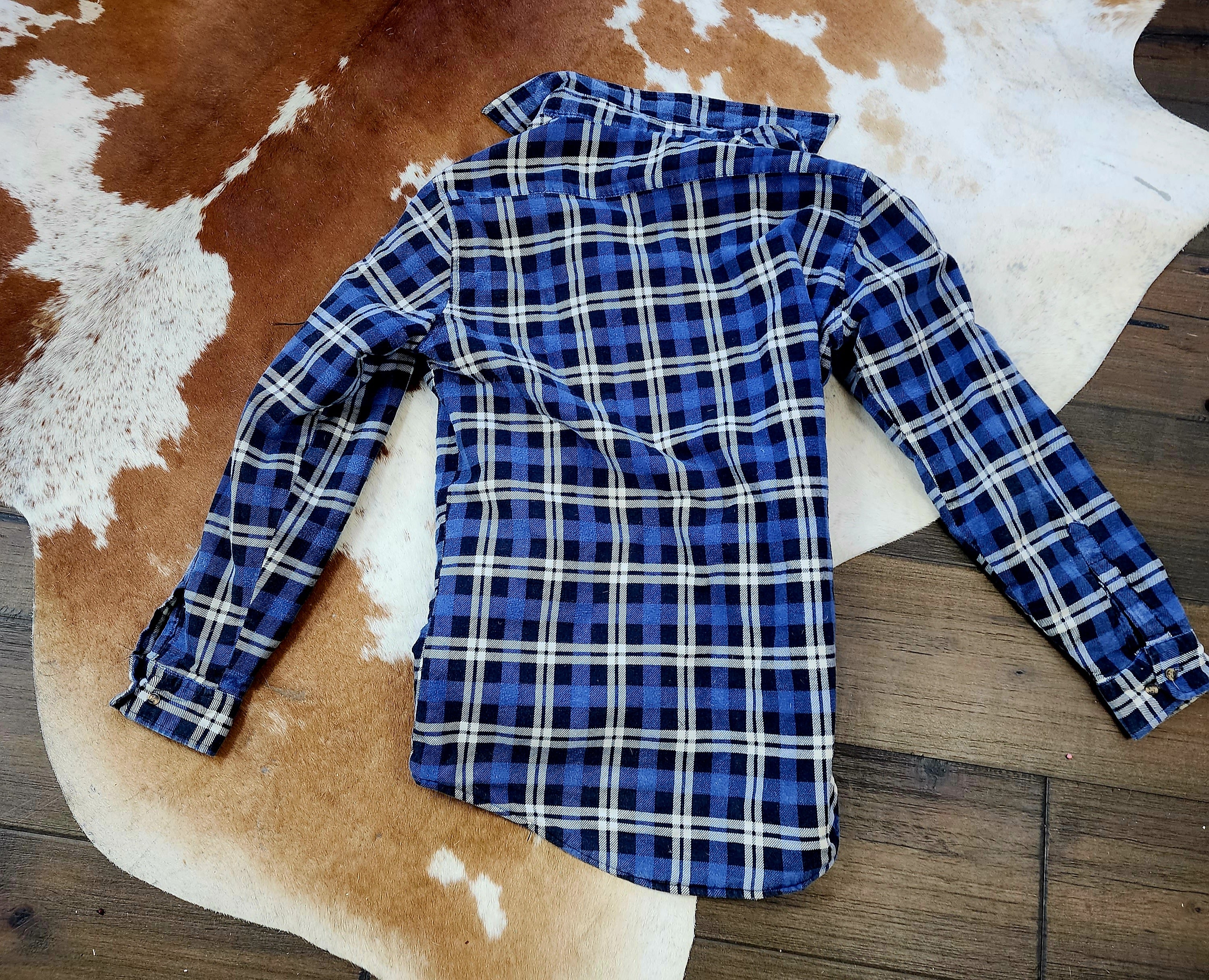Outdoor Exchange Blue, Black, and White Plaid