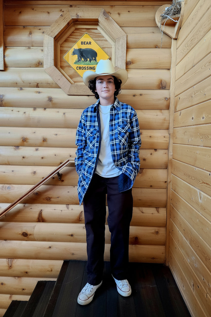 Outdoor Exchange Blue, Black, and White Plaid