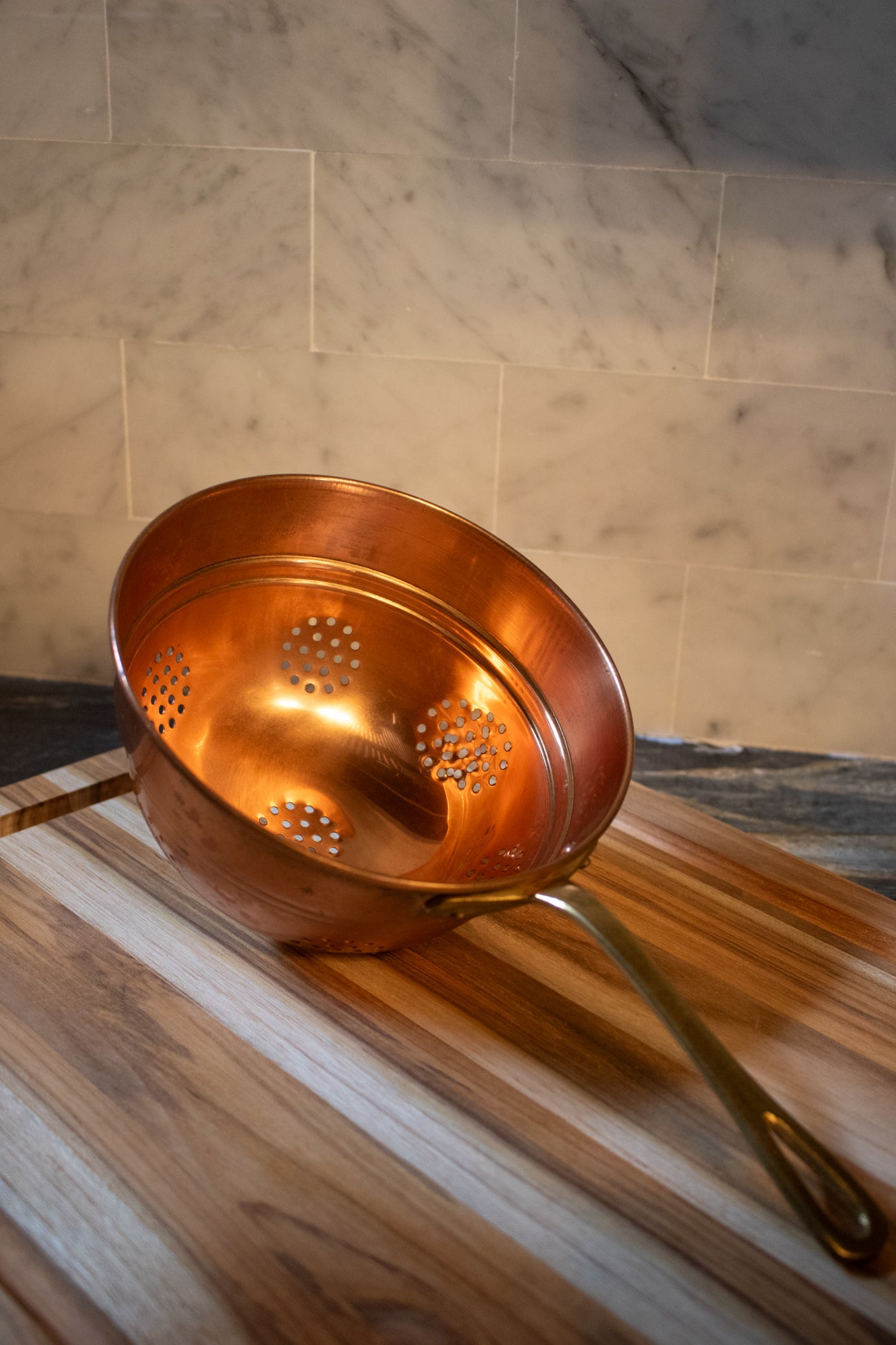 vintage solid copper strainer colander with perforated bowl and long solid brass handle