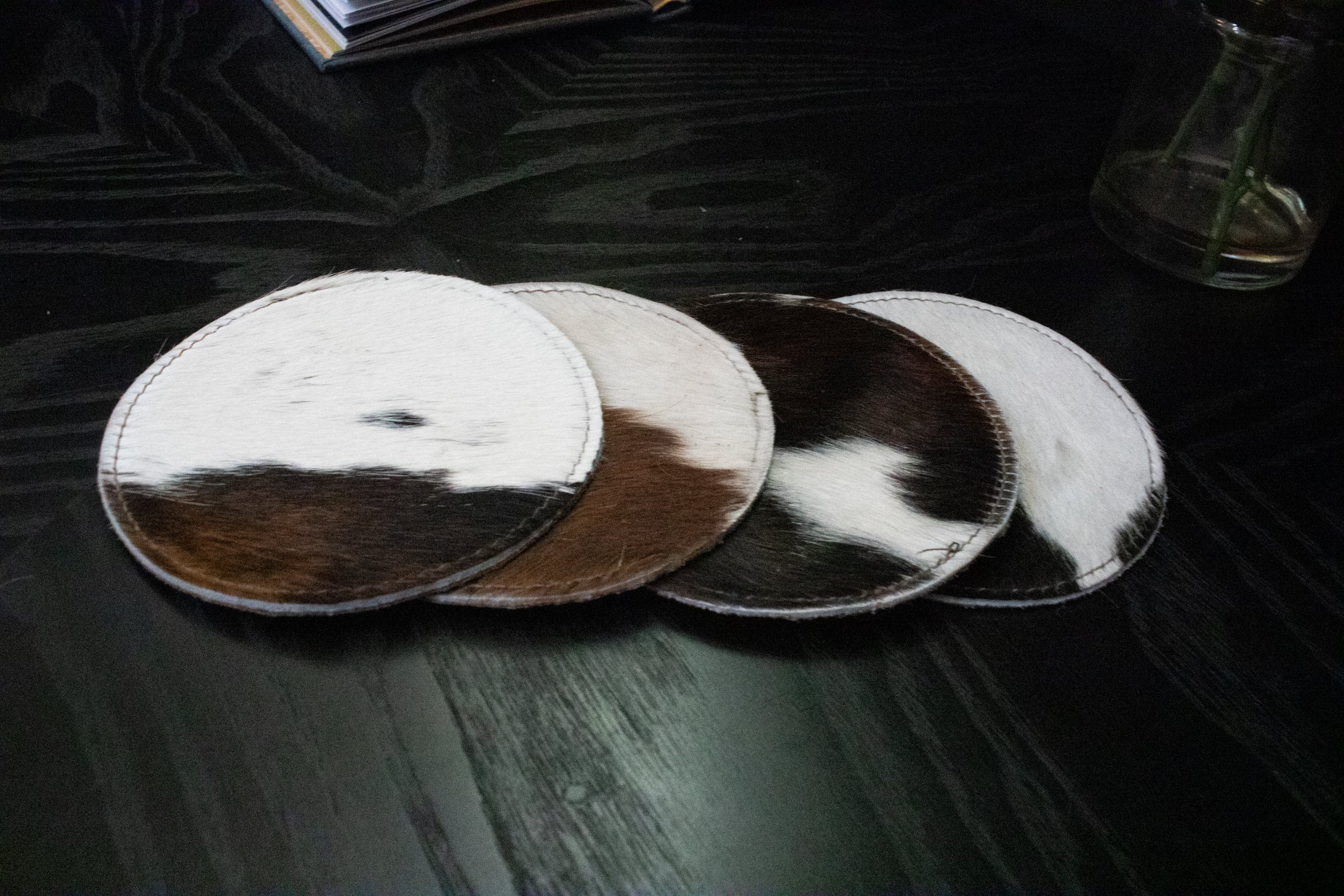 Set of 4 Black and White Cowhide Costars