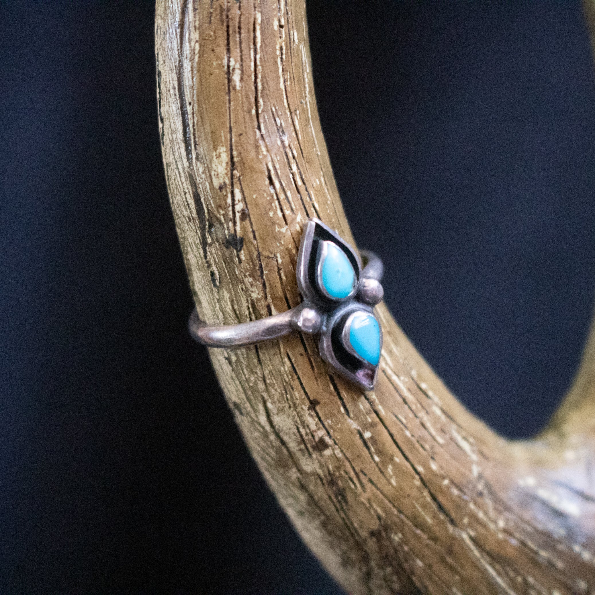 Turquoise Stones Embedded into a Sterling Silver Ring-Band Size 8.5