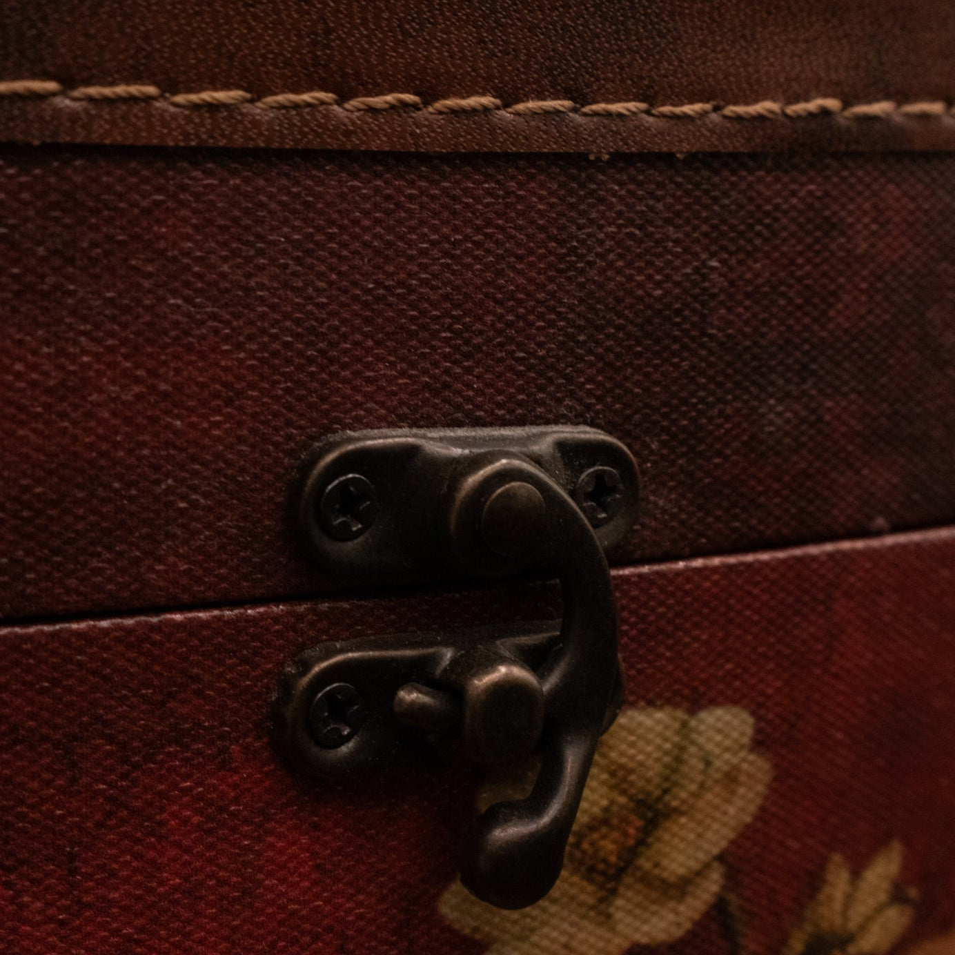 Elegant Dark Red Oval Box with Floral Design