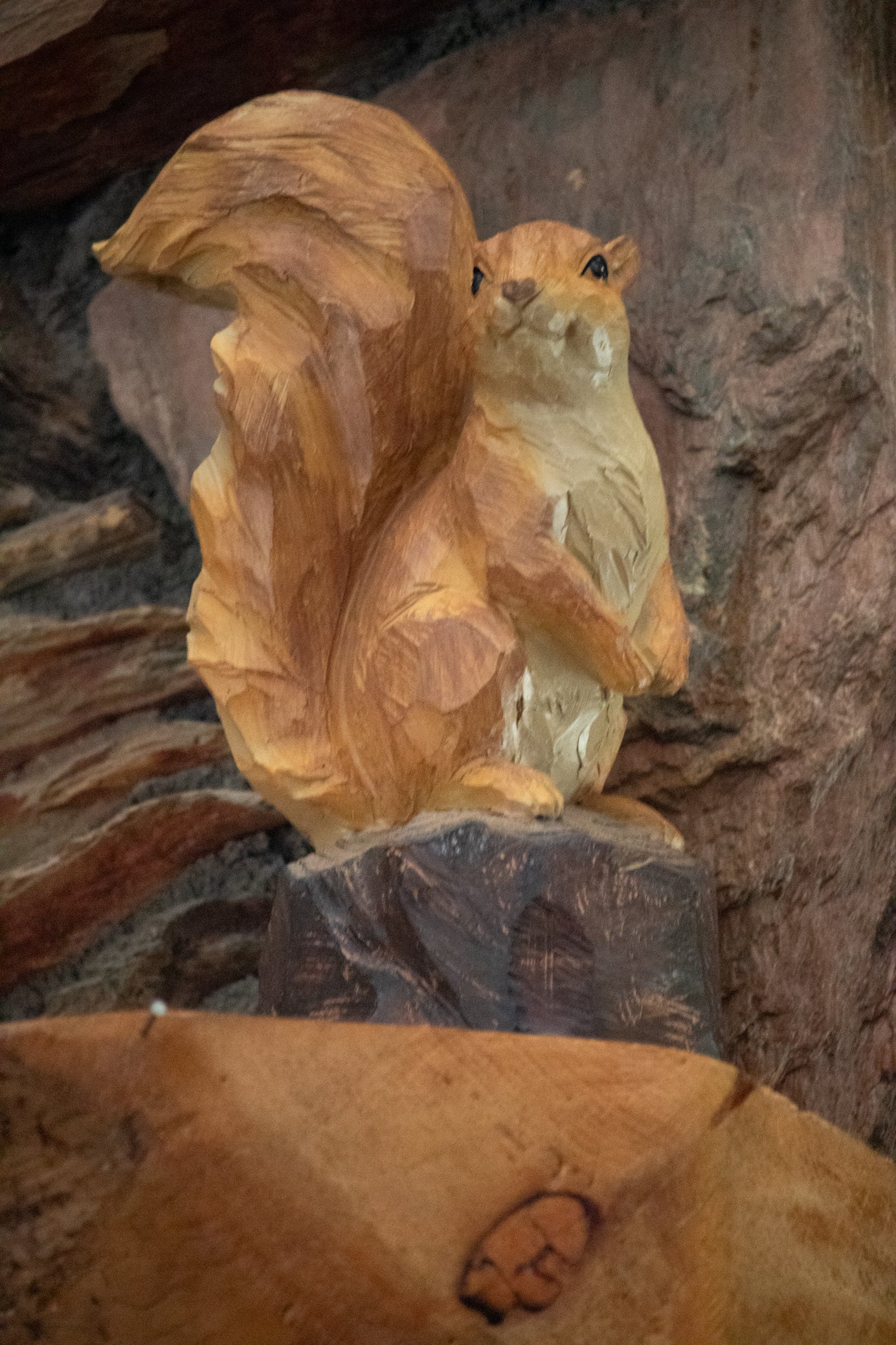 Resin Squirrel Sculpture Perched on Tree Stump