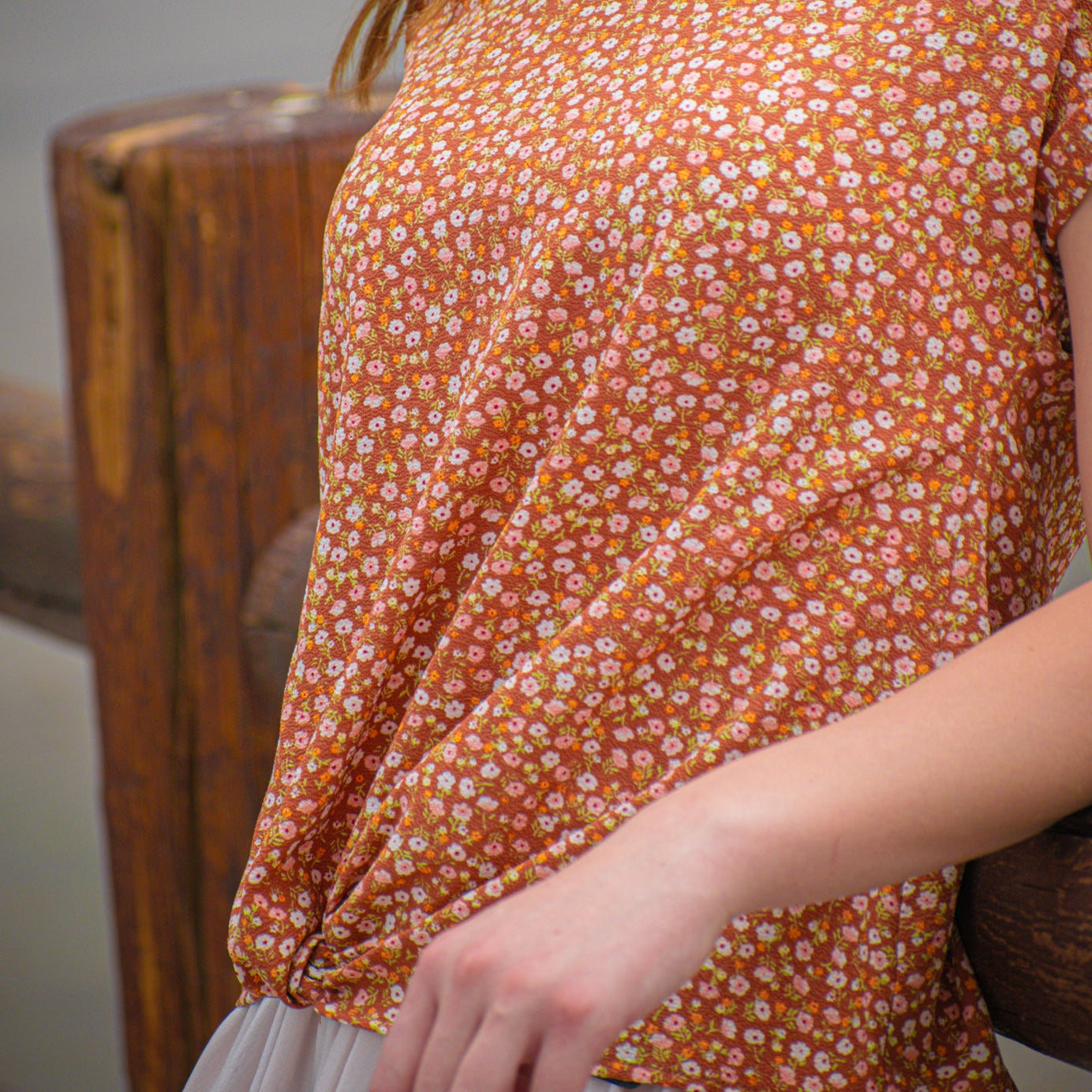 SO Floral T-shirt with a tie at the bottom of the shirt size XS