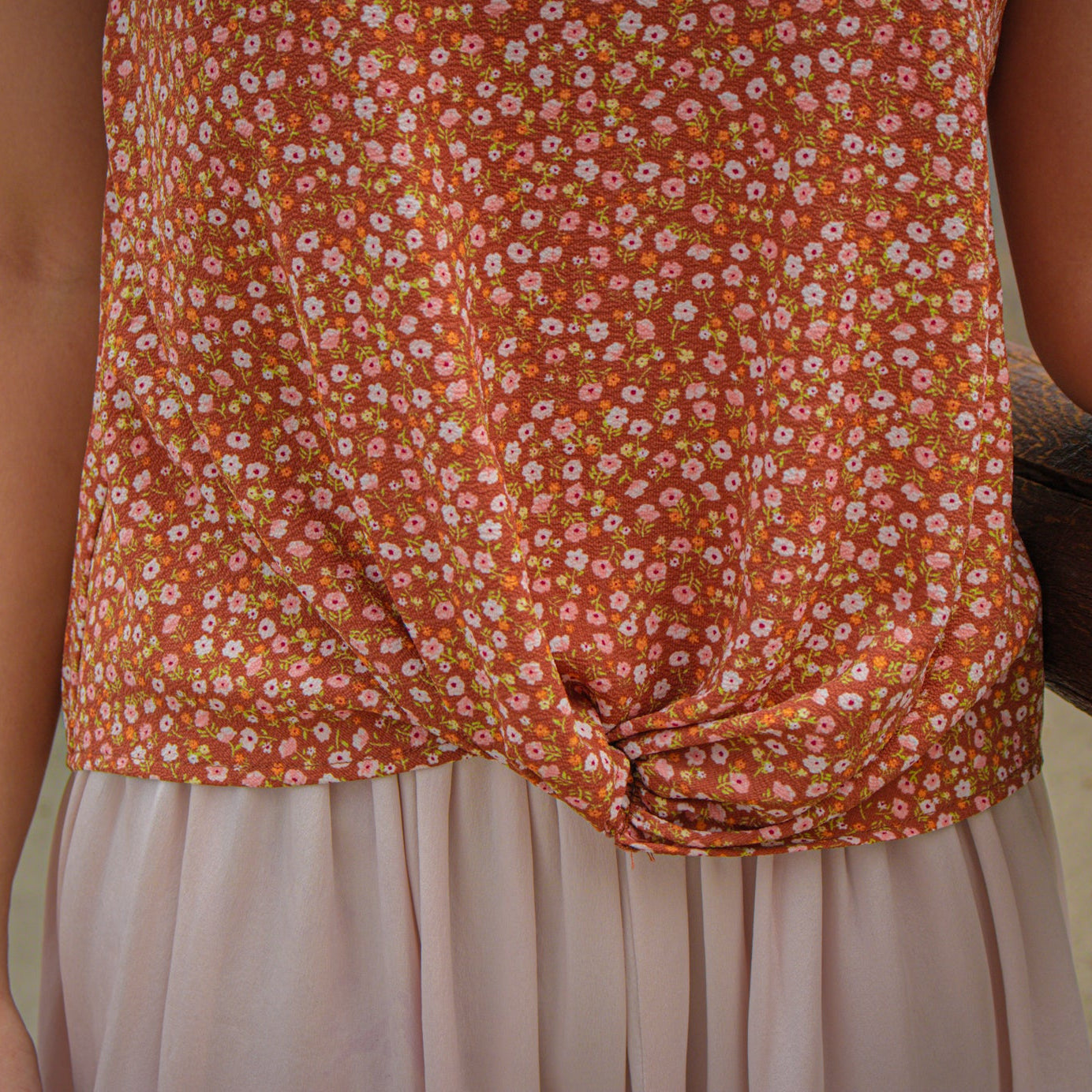 SO Floral T-shirt with a tie at the bottom of the shirt size XS