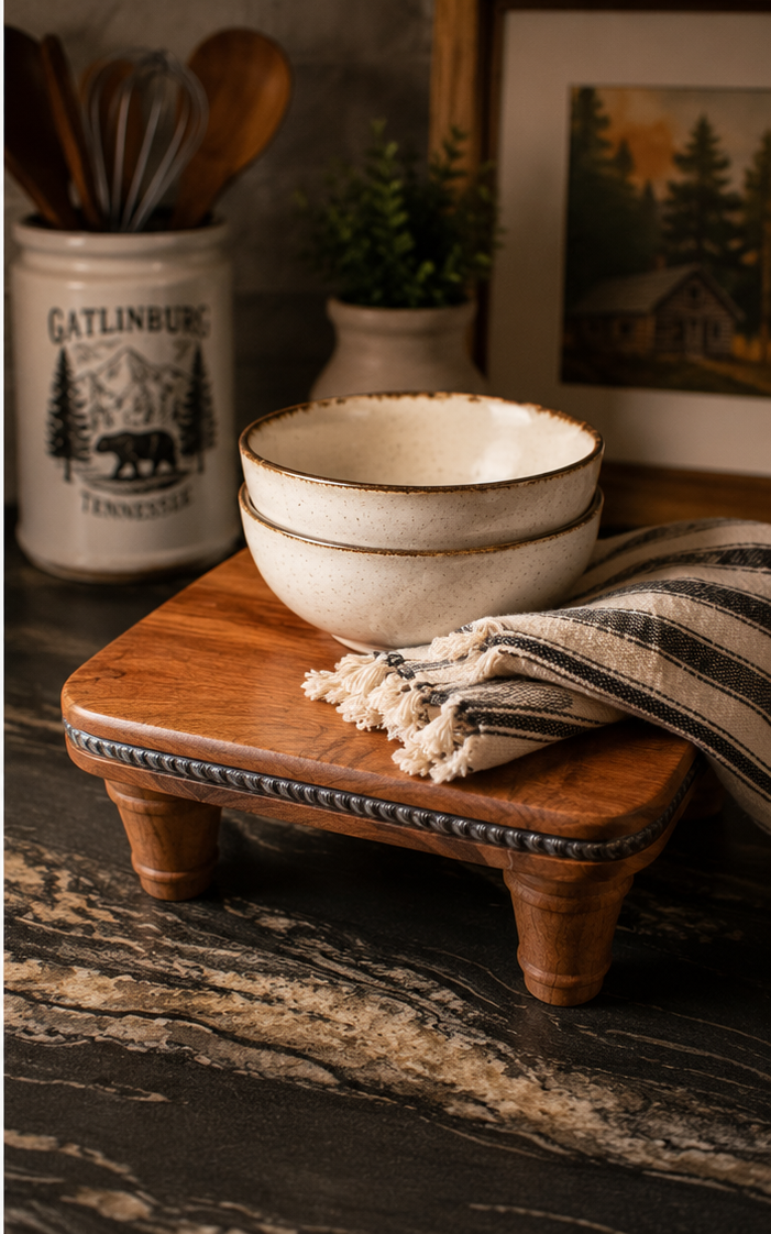 handcrafted solid wood pedestal display stand with turned legs and rich natural wood grain finish displayed on countertop